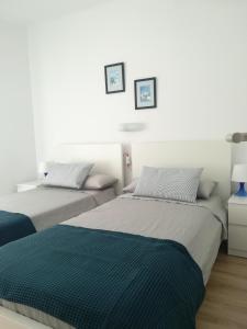 Posteľ alebo postele v izbe v ubytovaní Apartment IBIZA STYLE