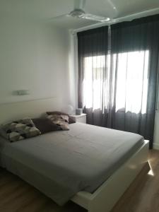 Posteľ alebo postele v izbe v ubytovaní Apartment IBIZA STYLE
