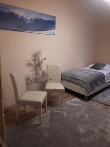 Posteľ alebo postele v izbe v ubytovaní Soda apartman