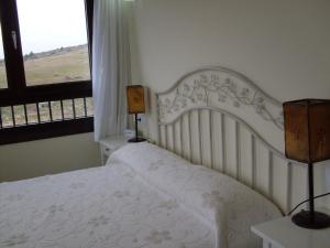 Posteľ alebo postele v izbe v ubytovaní Hotel Valdelinares (Soria)