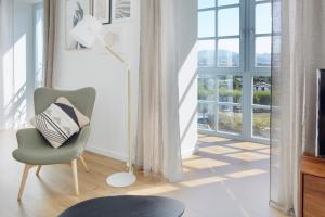 Część wypoczynkowa w obiekcie H SUITE3B by Smiling Rentals