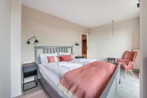 Posteľ alebo postele v izbe v ubytovaní Apartamenty Sun & Snow Residence II Jastrzębia Góra - plac zabaw, blisko plaży, wysoki standard