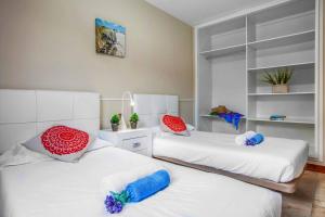 A bed or beds in a room at Villa Field Dreams