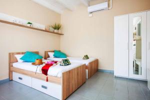 A bed or beds in a room at Villa Field Dreams