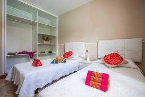 A bed or beds in a room at Villa Field Dreams