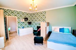 Posteľ alebo postele v izbe v ubytovaní City Life Apartments Kraków