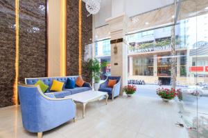 Khu vực ghế ngồi tại Cozrum Lux Hotel