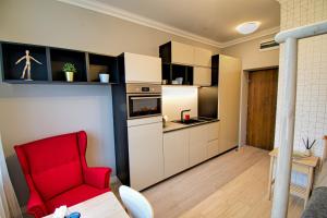 Kuchyňa alebo kuchynka v ubytovaní City Life Apartments Kraków