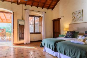 Ένα ή περισσότερα κρεβάτια σε δωμάτιο στο Casa Doña Justa