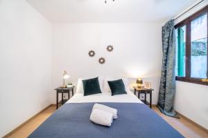 Postel nebo postele na pokoji v ubytování Haus Ormesini
