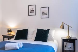 Postel nebo postele na pokoji v ubytování Haus Ormesini