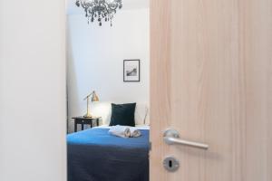 Postel nebo postele na pokoji v ubytování Haus Ormesini