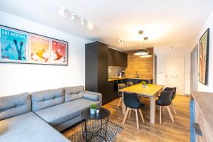Posedenie v ubytovaní Kaprun Apartments