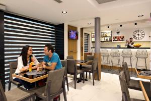 Nápoje v ubytování Hotel Ideon