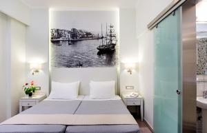 Postel nebo postele na pokoji v ubytování Hotel Ideon