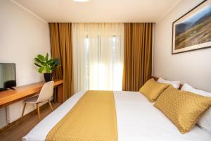 Katil atau katil-katil dalam bilik di Orbi Palace Hotel Official