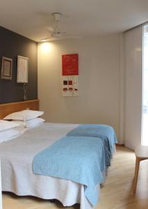 Posteľ alebo postele v izbe v ubytovaní Hotel Zarampallo