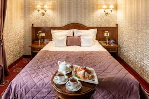 Postel nebo postele na pokoji v ubytování Hotel Atlas Deluxe