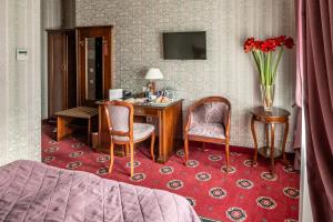 TV a/nebo společenská místnost v ubytování Hotel Atlas Deluxe
