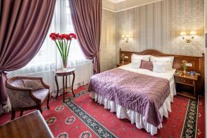 Postel nebo postele na pokoji v ubytování Hotel Atlas Deluxe