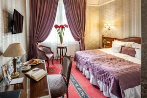 Postel nebo postele na pokoji v ubytování Hotel Atlas Deluxe