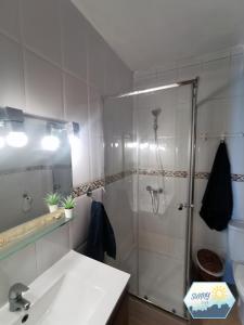 a bathroom with a shower and a sink at Sunny Churriana-Airport in Málaga