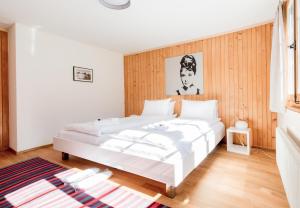 Postel nebo postele na pokoji v ubytování Chalet Arven