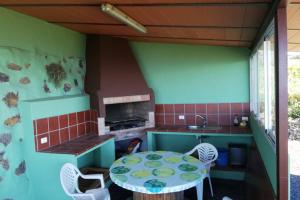 A kitchen or kitchenette at CASA DE LA CRUZ