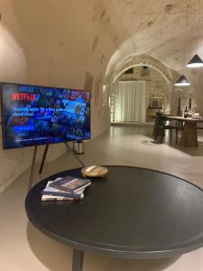 TV a/nebo společenská místnost v ubytování StageROOM01 - Matera