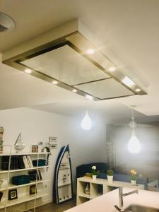 Kuchyňa alebo kuchynka v ubytovaní Ático 90m de terraza, jacuzzi privado y cargador de coche eléctrico en Cabria, Almuñecar