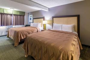 A bed or beds in a room at Roosevelt Hotel