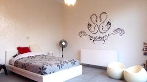 Katil atau katil-katil dalam bilik di PLANT BASED b&b central Bruges