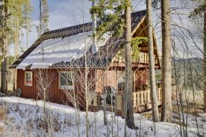 a log cabin in the snow with trees at 2 Mi to Slopes Mtn-View Breckenridge Getaway! in Breckenridge