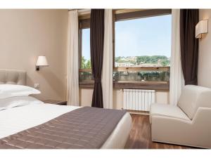 Säng eller sängar i ett rum på Window On Rome