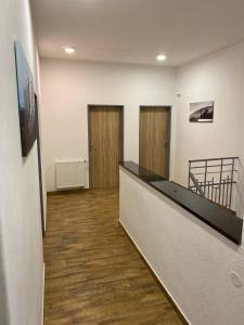 Televízia a/alebo spoločenská miestnosť v ubytovaní Frýdecká Apartments