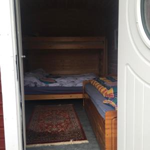 
Łóżko lub łóżka w pokoju w obiekcie Fritidsbolig ca 20 min fra Tromsø Sentrum
