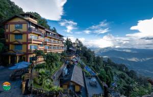 a hotel on the side of a mountain at Hotel Country Villa in Nagarkot