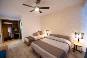 Cama ou camas em um quarto em Summer Village of Hippokrates - Adults only