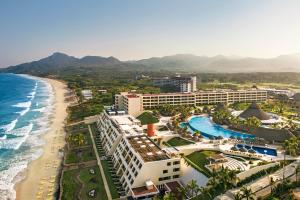 an aerial view of the hotel and the beach at Iberostar Selection Playa Mita in Punta Mita