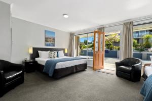 Letto o letti in una camera di Central Gateway Motel