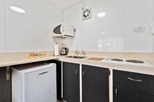Cucina o angolo cottura di Central Gateway Motel