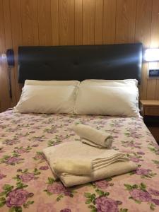 Postel nebo postele na pokoji v ubytování Hotel Giordano Spiaggia