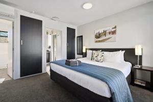 Letto o letti in una camera di Central Gateway Motel