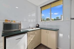 Cucina o angolo cottura di Central Gateway Motel