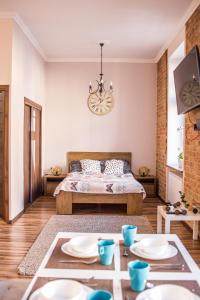 Posteľ alebo postele v izbe v ubytovaní Voal Apartamenty