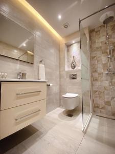 Ванна кімната в Tiffany Lux Apartment