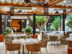 A restaurant or other place to eat at Hotel Bel-Air - Dorchester Collection