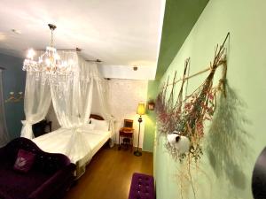 Postel nebo postele na pokoji v ubytování Sea Princess B&B