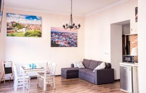 Posedenie v ubytovaní Voal Apartamenty