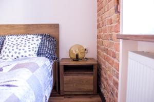 Posteľ alebo postele v izbe v ubytovaní Voal Apartamenty